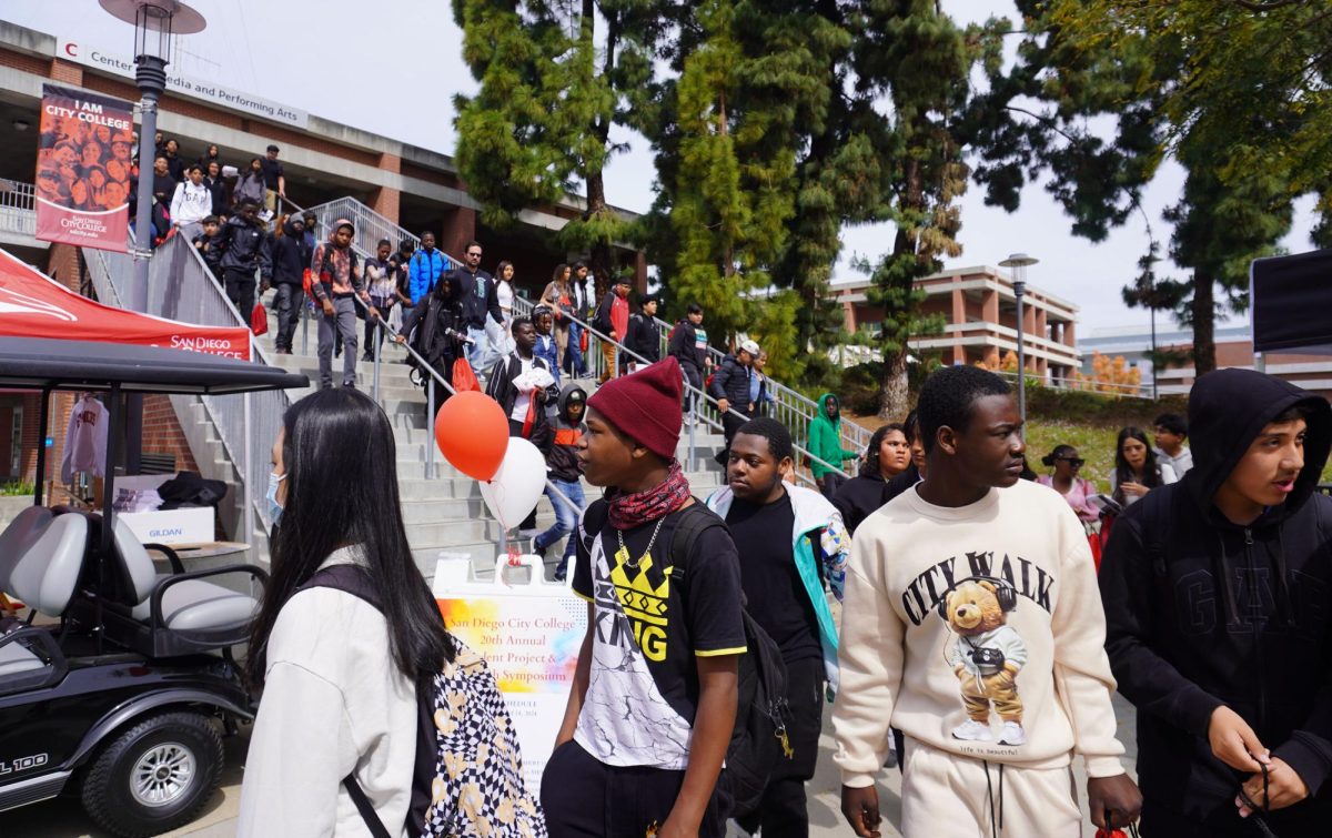 High schoolers flood down the stairs at the San Diego City College Open House, April 18, 2024. Photo by Naylise DeGroat/City Times Media